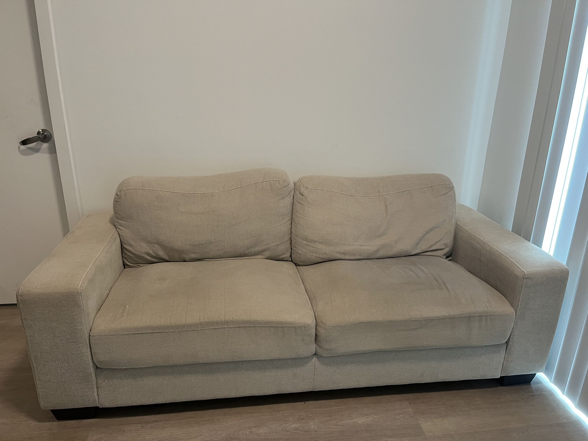 Beige Two-Seater Sofa