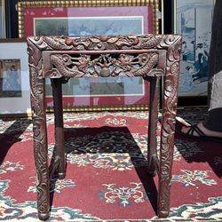 Antique carved wooden table