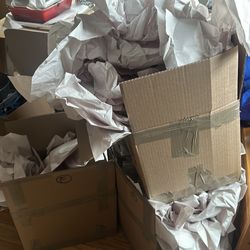 Free moving boxes and packing paper