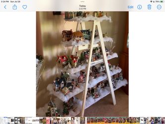 Christmas village set with, shelves, ladder,figurines,lights