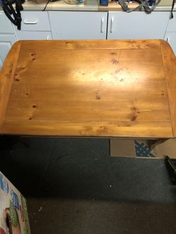 Solid wood coffee table with rustic leaves