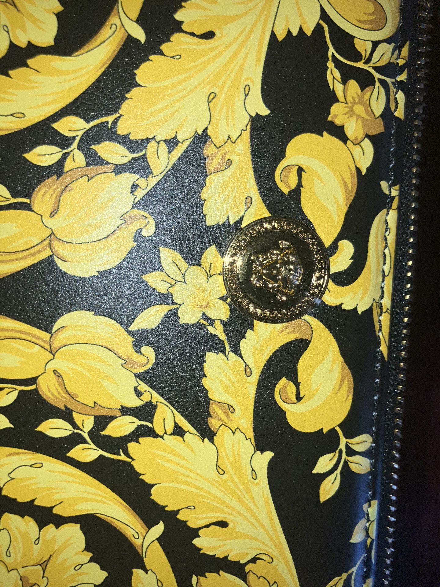 Black and gold unisex versace bag