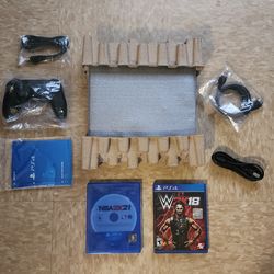 PLAYSTATION 4 1TB SLIM NIB WITH TWO PRE OWN GAMES