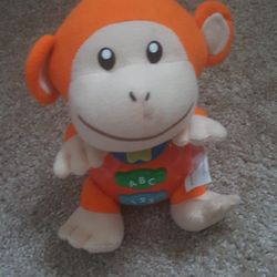 Singing Orange Monkey Toy Alphabet Numbers