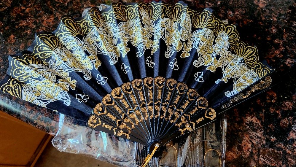 4 Black And Gold Fans