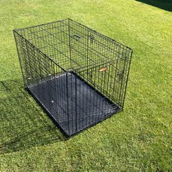 Real nice dog kennel 42 inches long by 28 inches wide by 30 inches high