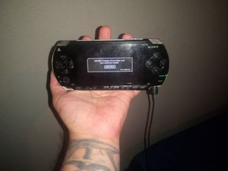Original PSP with charger needs battery