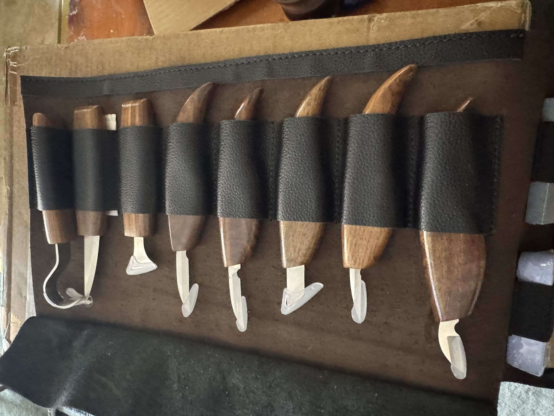 Eight piece wood carving set with leather pouch