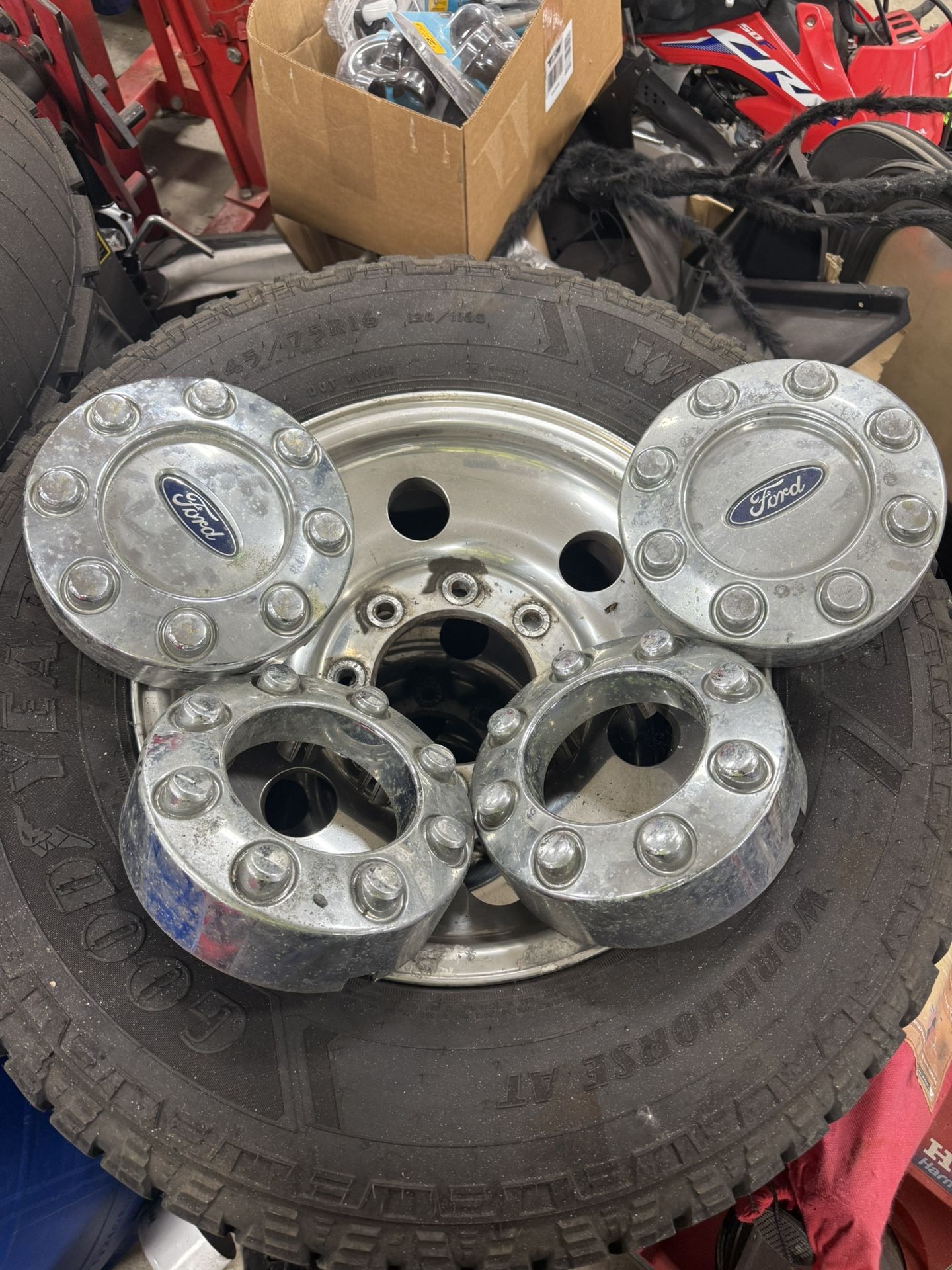 Good Year wrangler 245/75R16 tires on 8 lug f250 rims. They where in the back of a truck I bought. I never ran them. They all seem to have even wea