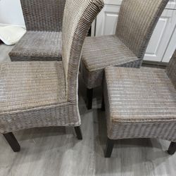 4 strong  impecable wicker kitchen chairs ,  repainted to match my kitchen ! No longer need them but I love every bit of them ! 