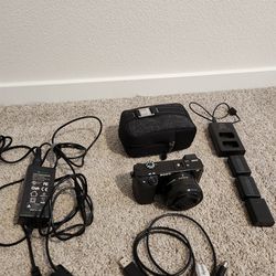 Sony A6100 W/ Kit Lens And Accessories