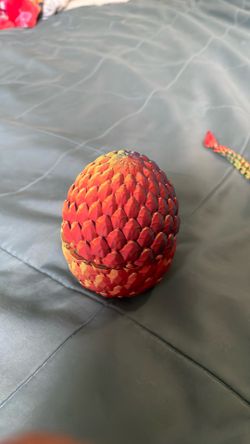 3d printed dragon with egg.