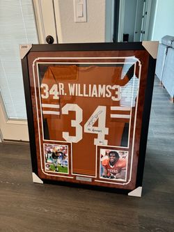Autographed Ricky Williams jersey