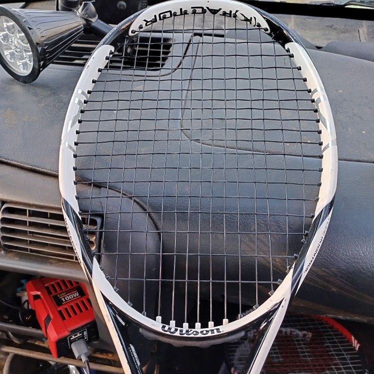 Wilson k factor and a Wilson Federer tennis racket