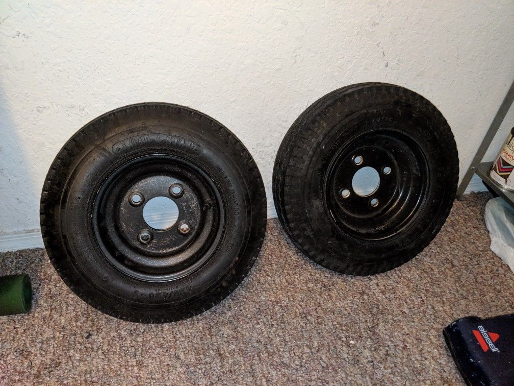 Trailer rims and tires great condition