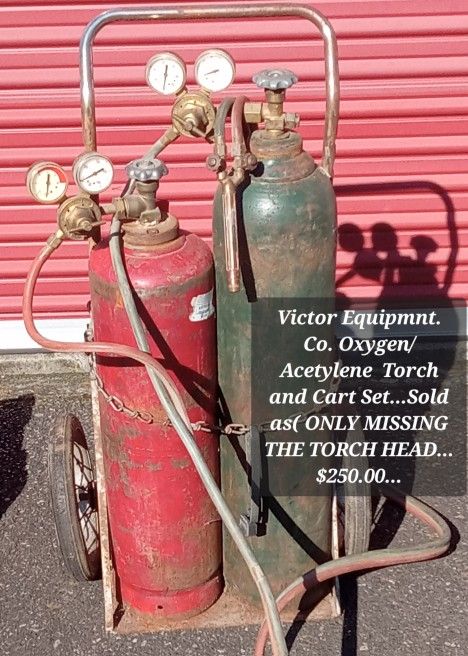 Victor OXYGEN/ ACETYLENE TORCH SET.... Victor GUAGES, VICTOR MIXING VALVES,VICTOR TORCH... TORCH HAS NO TORCH HEAD... TANKS EMPTY...