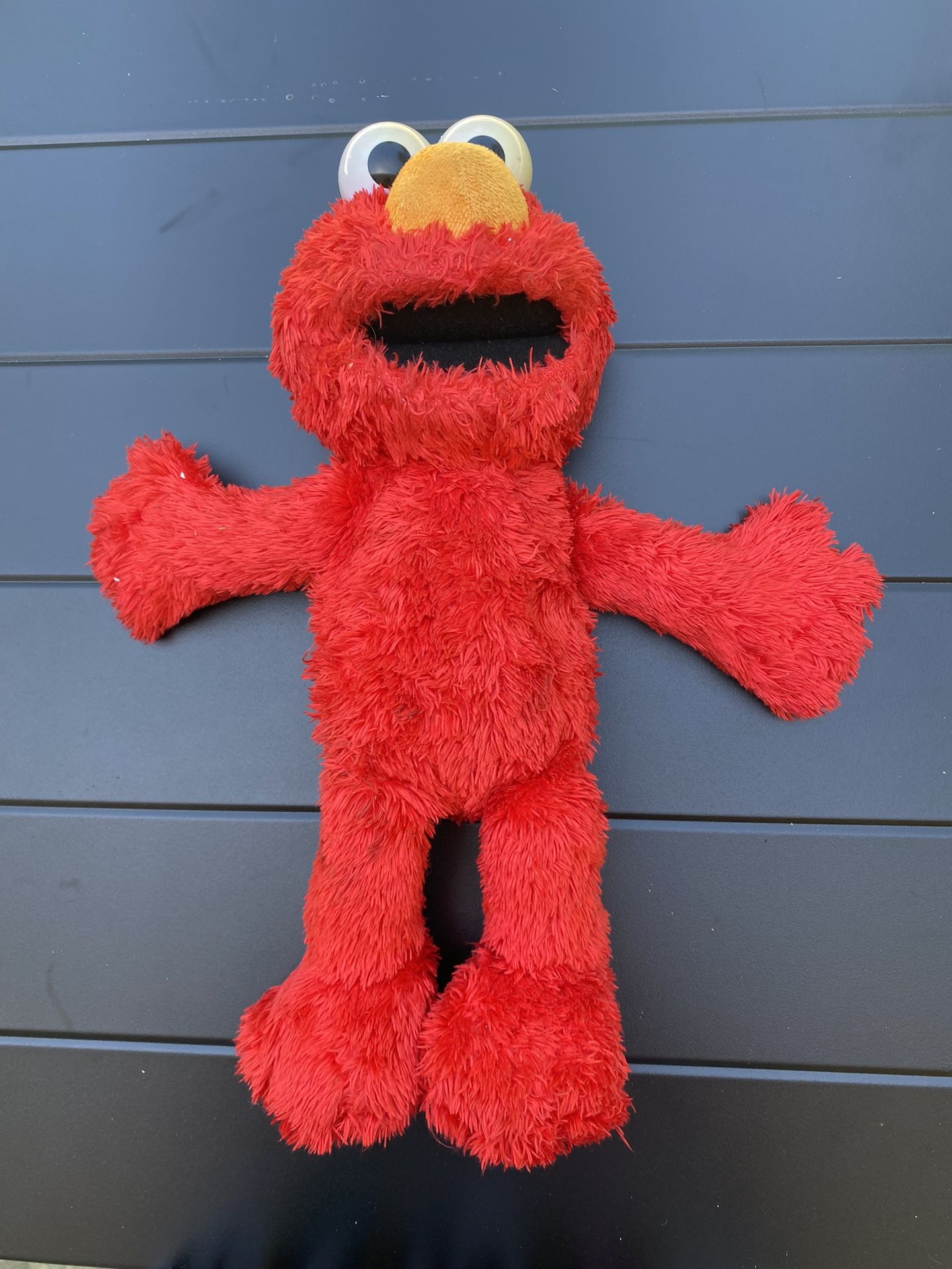 Sesame Street Tickle Me Elmo 13.5-inch Plush Doll, Laughs, Wiggles, and Giggles