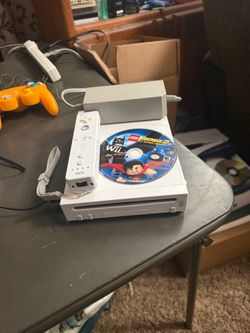 Nintendo Wii Console with Remote and Game