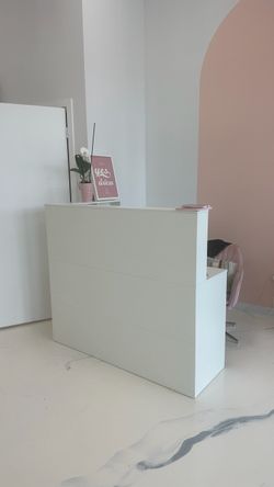 Modern White Reception Desk – $300