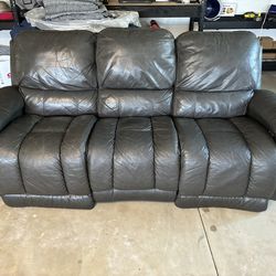 Black leather lounge couch
