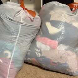 2 Bags Full Of Woman Clothes