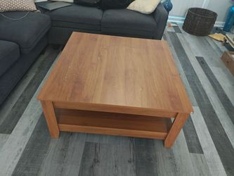 Rectangular coffee table with storage shelf