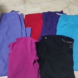 Women Scrubs 2 Shirt Size Medium 4 Pants Size Medium Excellent Condition  All For 25 Dollars