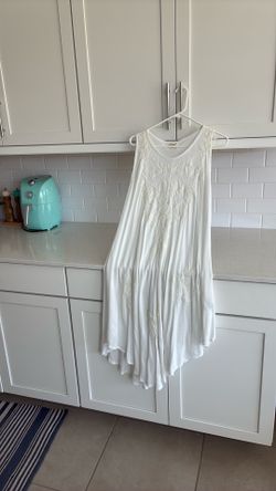Pretty white embroidered sleeveless summer dress