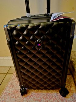 HARDSHELL SUITCASE NEW WITH TAGS 20 INCH SIZE BLACK