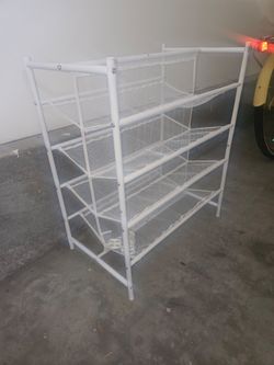 White dual shoe rack on wheels