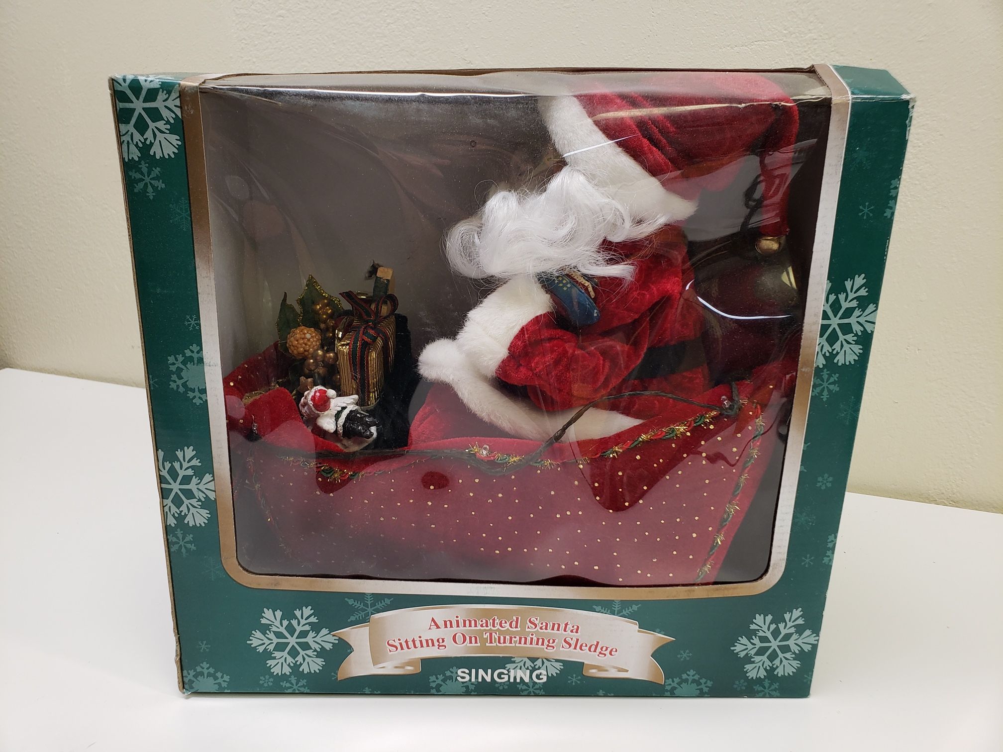 Animated Santa Sitting On Turning Sledge