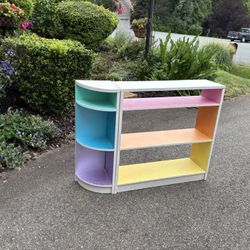 bookshelf With Rainbow Colored Shelves 