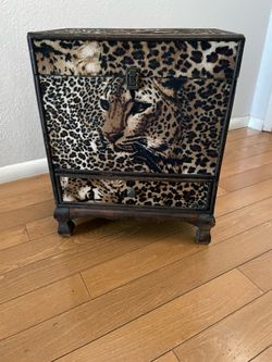 Pier one imports animal print -15 .5 inches wide/ 10 inches deep / 20 inches high it’s wood with burgundy liner a wiith 2 compartments