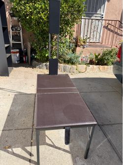 Massage table   ( not sure)   46” long 22” side  21” high