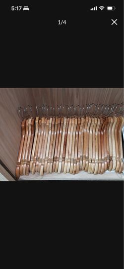 Brookstone solid wood hangers excellent condition