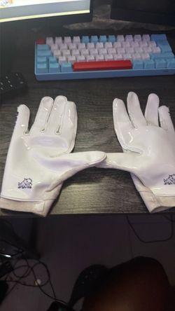 White and purple Nike TCU college gloves