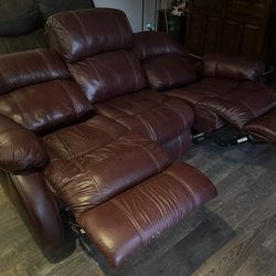 Leather couch with two recliners.
