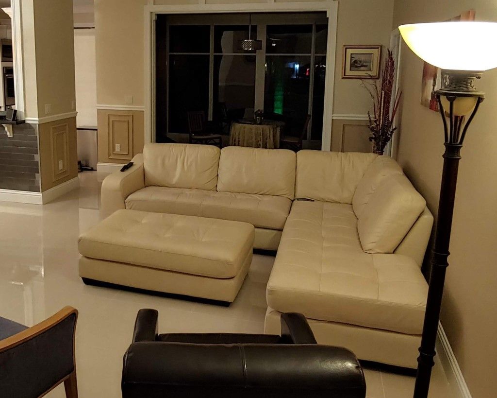 Leather Sectional And Ottoman