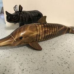 Gorgeous Hand Carved  And Hand Painted  Wooden  Animal Figurines.  Fish is 12.5 inch L and 3.5 inch H and a Rhinoceros L -8 inch and H- 4.5 inch. 