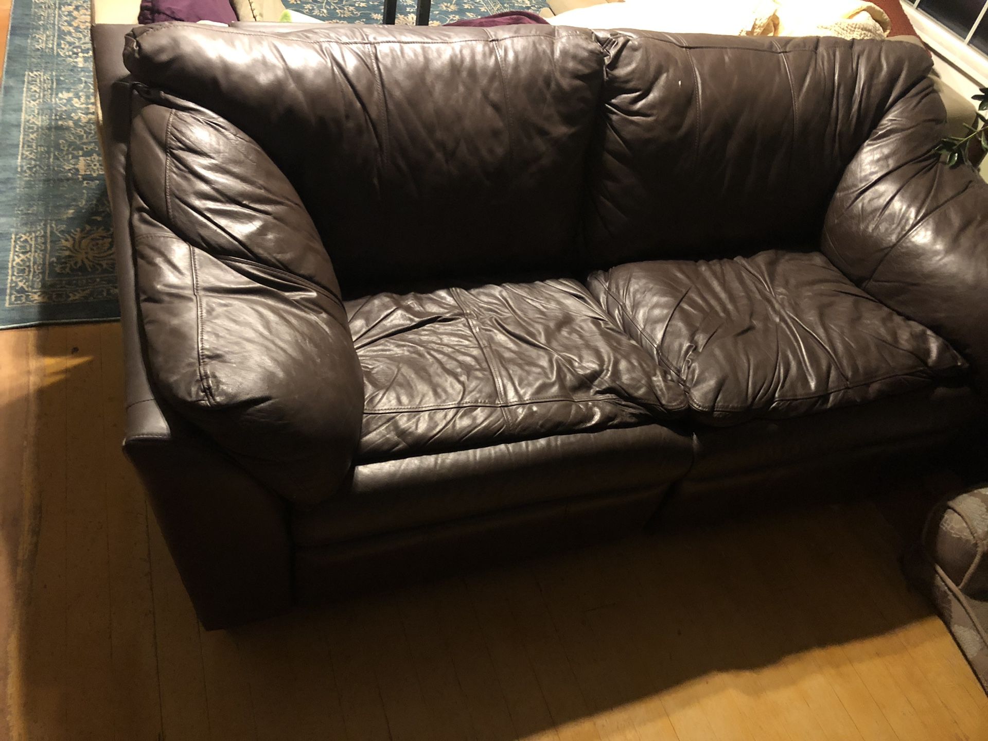 Brown pleather pull-out couch