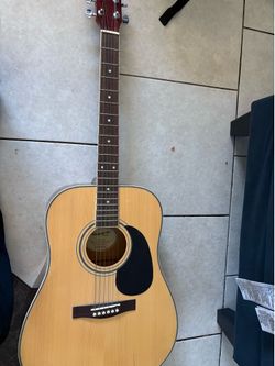 Starcaster acoustic guitar