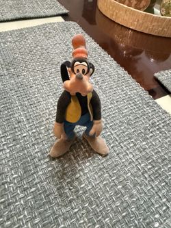 Very rare vintage bendable figure of the Disney character Goofy, featuring a prominent felt-like texture.