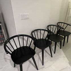 4 Brand new black wooden dining chairs