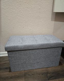 Small Ottoman foldable  gray like new