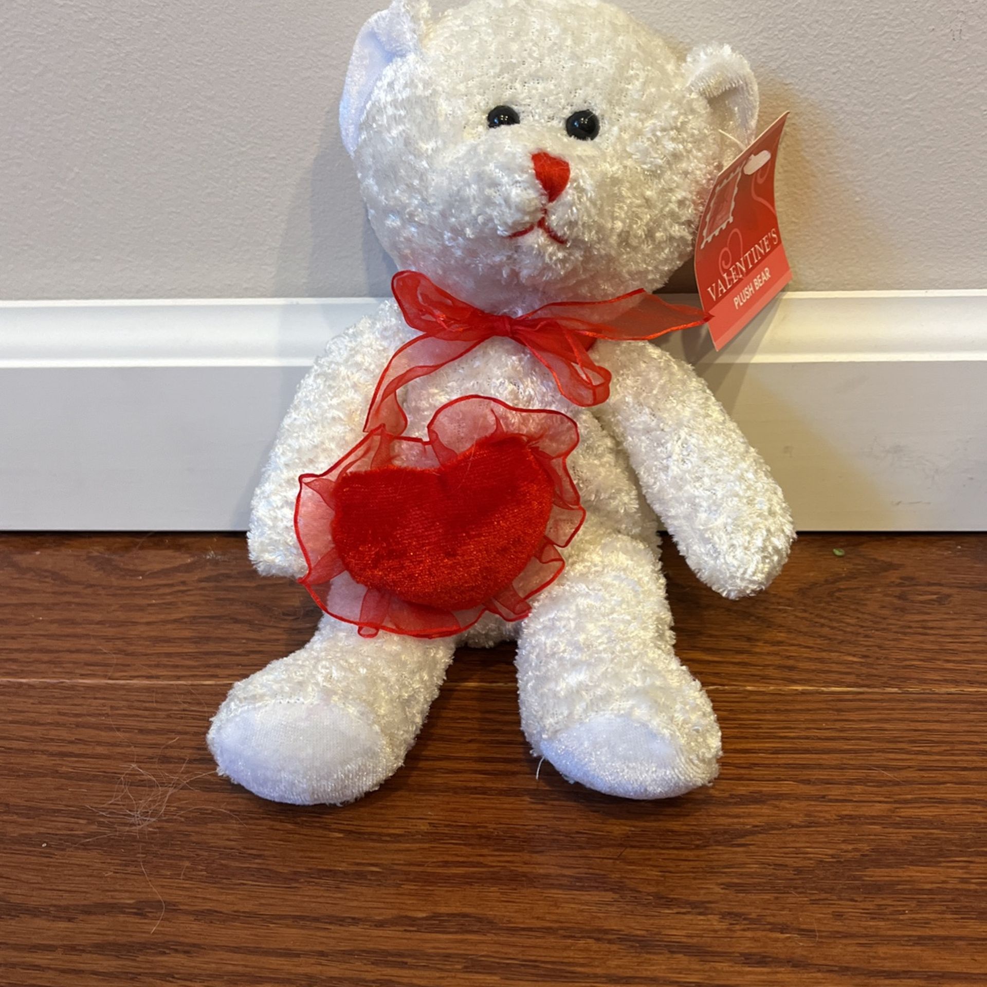 9”  white plush teddy bear with a red heart and bow