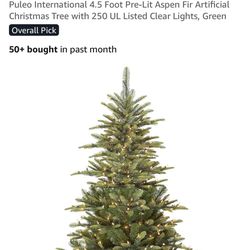 Brand new 4 1/2 foot pre-lit Christmas tree still in box. And Christmas ornaments.