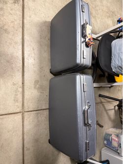 American tourister suit cases