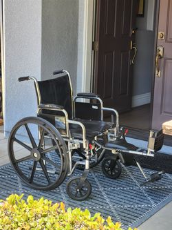 Used wheele chair w/ adjustable legs
