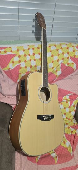 Acoustic-Electric Cutaway Guitar Natural Finish. $79