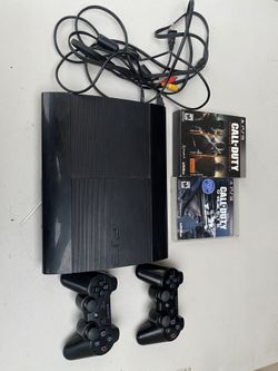 Play Station 3 With Four Games & All Cords With It